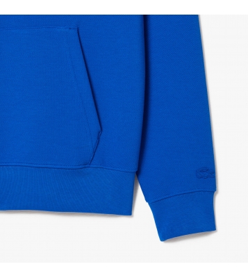 Lacoste  Sweat à capuche en piqué bleu